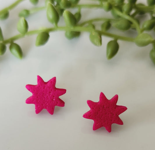 Handmande Polymer Clay Earring Studs! Beautiful, bold, lightweight clay star studs! Add a pop of color to your outfit with this matte textured stud. Approximately .5".