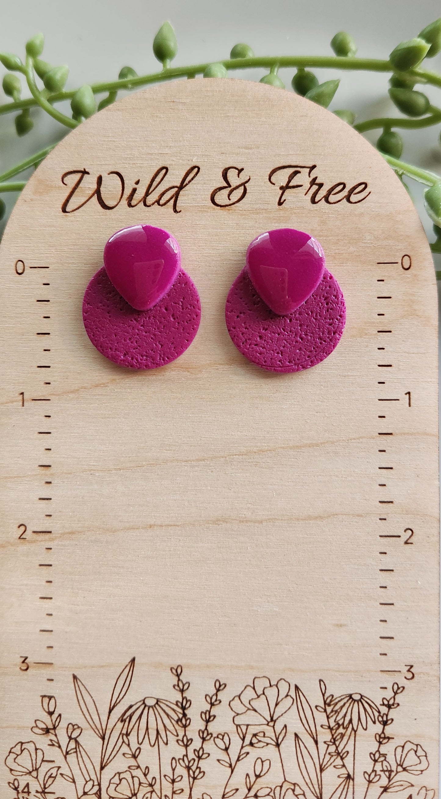 Handmade polymer clay earrings! Beautiful fuchsia color meant to be bold and stand out! These earrings are designed with fuchsia clay mix, with a matte cicle and a rounded upside down glossy triangle. Medium size studs approximately 1" long.