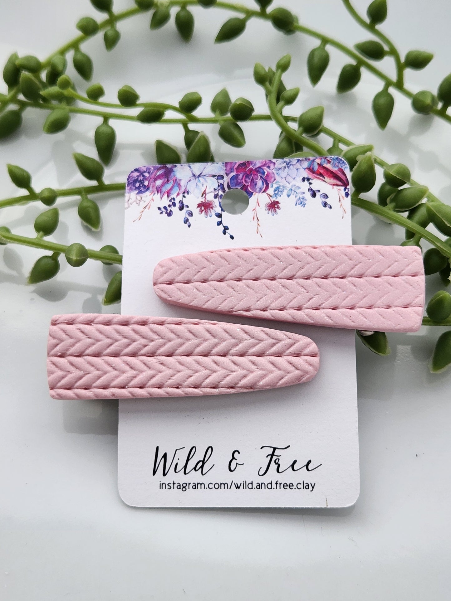 Handmade polymer clay hair clips! Super lightweight clips that bring a pop to any outfit! This beautiful clip is handmade with polymer clay in a blush pink color. It is matte and textured in a knit woven fabric look. Approximately 2.5" long.